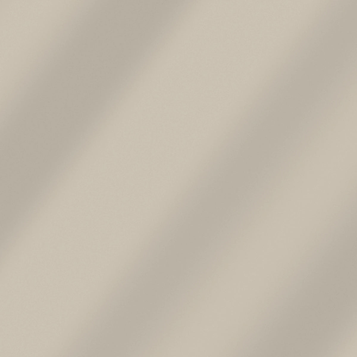 Solid Gray Tan quilting cotton – soft draped fabric showing the true color