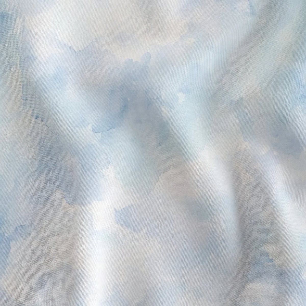 Soft watercolor blue Ocean Texture blender fabric draped to show the soft hand