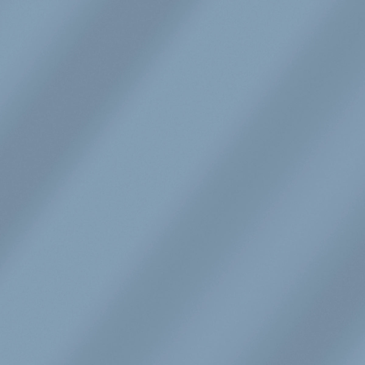 Solid Blue-Gray quilting cotton – soft draped fabric showing the true color
