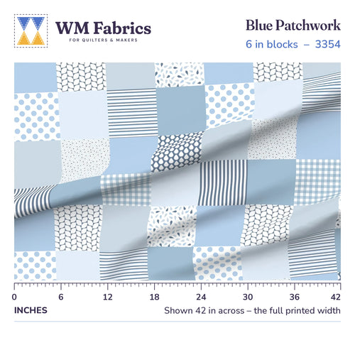 Blue patchwork baby boy cheater quilt fabric with 6 inch blocks, shown 42 inches across with a ruler to show true scale