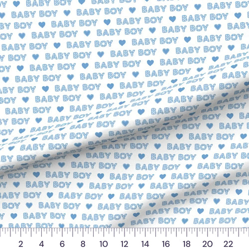 Baby Boy Word quilting cotton fabric – draped close-up with a ruler showing true print scale