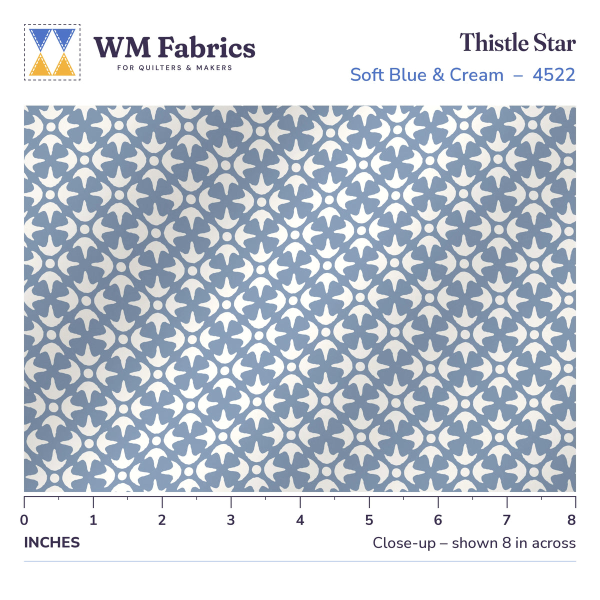 8 inch close-up of Thistle Star Soft Blue & Cream quilting cotton with a ruler showing the true size of the print