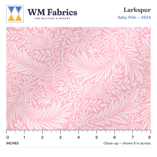 8 inch close-up of Baby Pink William Morris Larkspur quilting cotton with an inch ruler showing the true size of the print