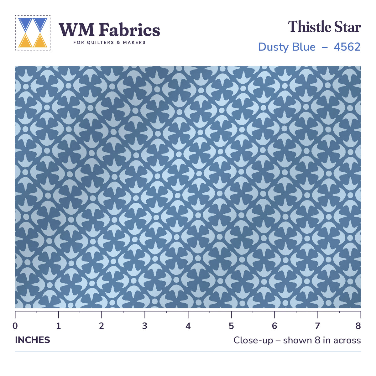 8 inch close-up of Thistle Star Dusty Blue quilting cotton with a ruler showing the true size of the print
