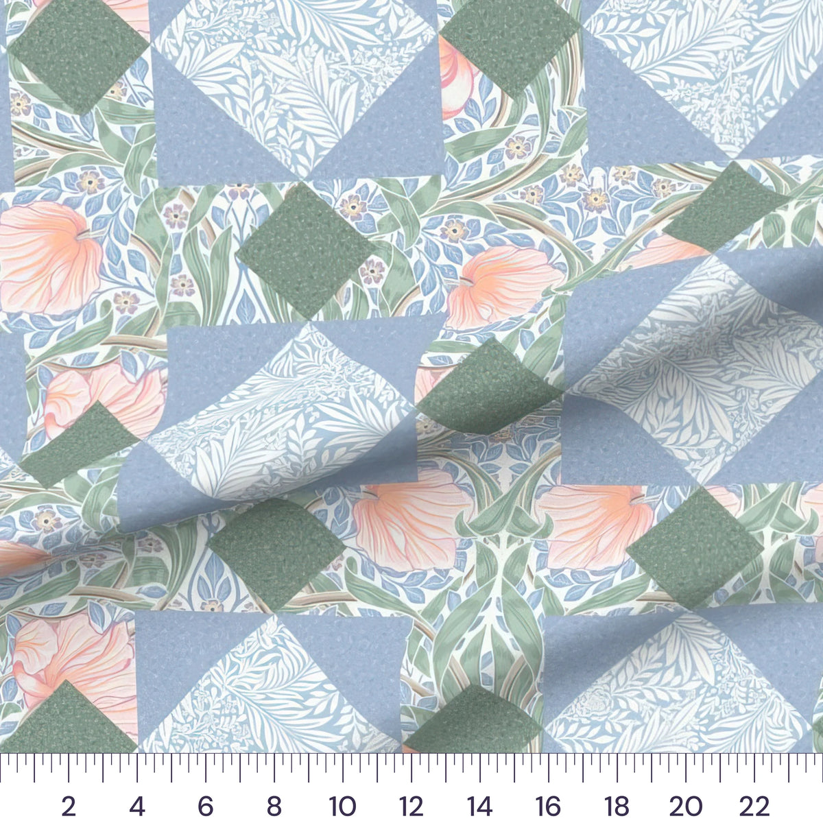 William Morris Pimpernel Lone Star cheater quilt fabric by the yard with 12 inch star blocks, draped quilting cotton with a ruler showing true scale