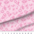 Peony Sketch Pink Stems quilting cotton fabric – draped close-up with a ruler showing true print scale