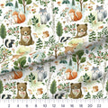 Woodland Animals Toss quilting cotton fabric – draped close-up with a ruler showing true print scale