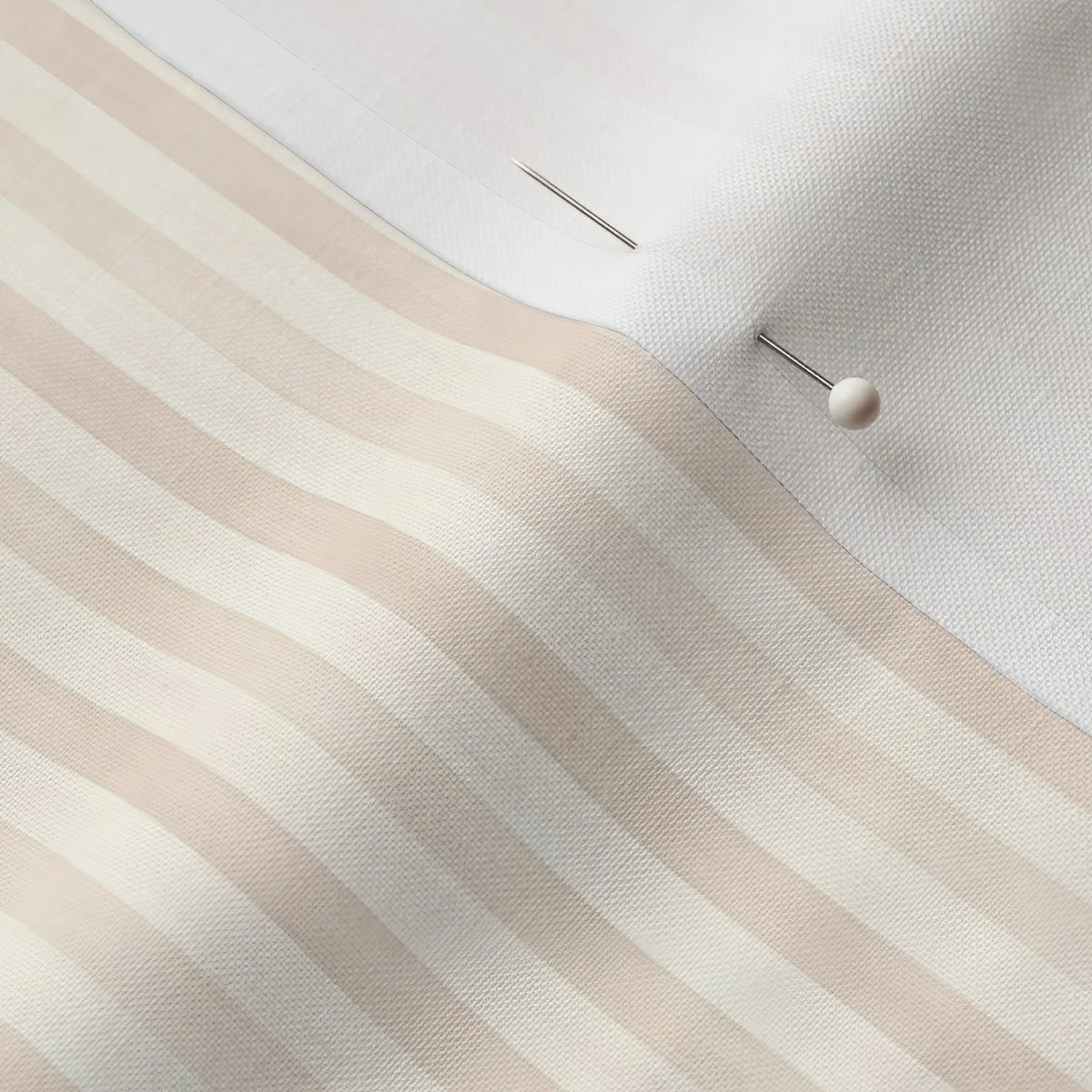Pinned close-up of Elodie Stripe 1/4 inch fabric showing the white selvage margin