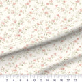 Elodie Floral quilting cotton fabric – draped close-up with a ruler showing true print scale