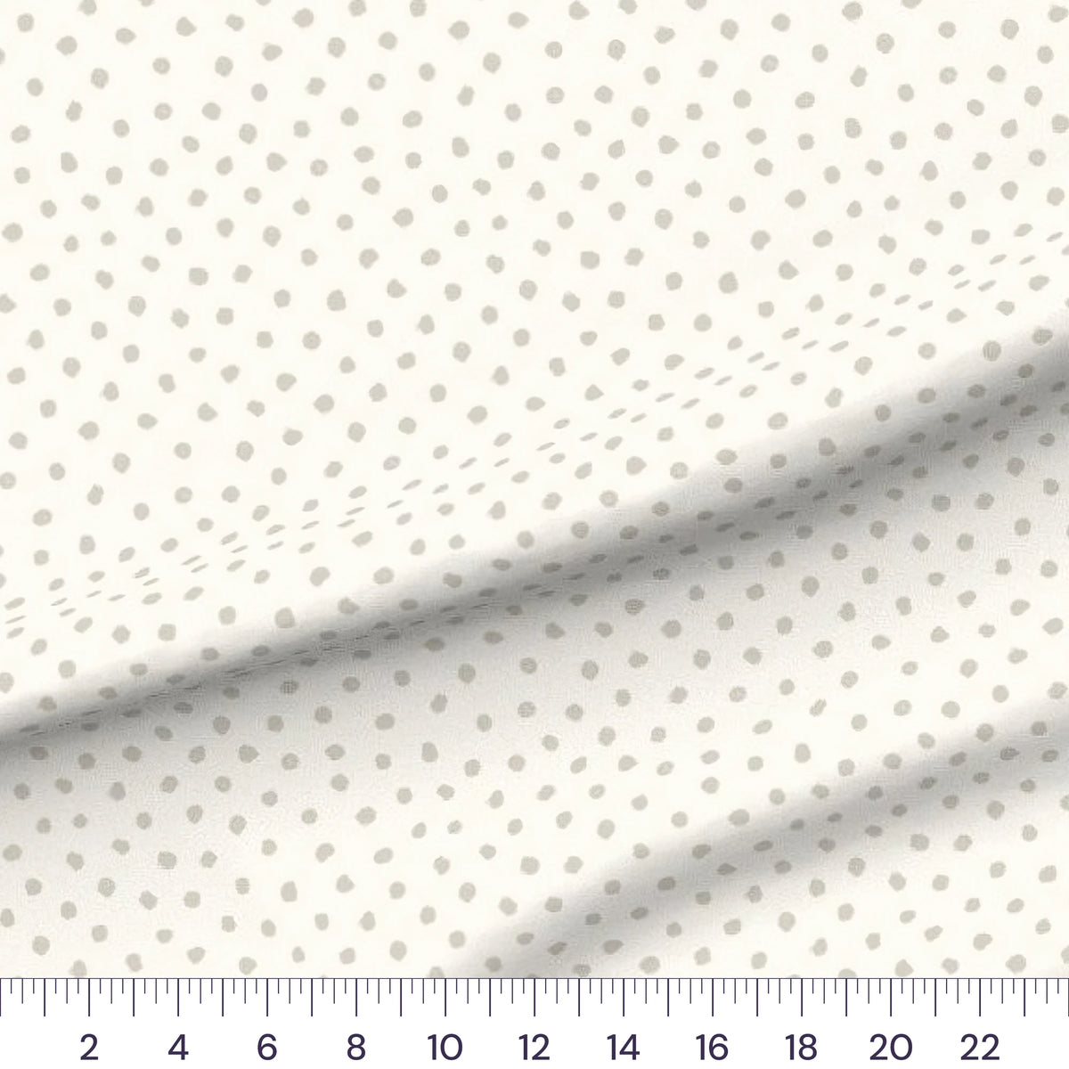 Doodle Dots quilting cotton fabric – draped close-up with a ruler showing true print scale
