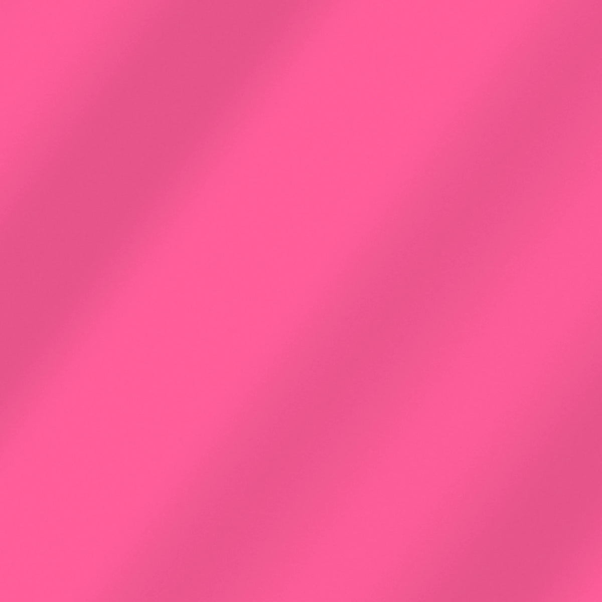 Solid Hot Pink quilting cotton – soft draped fabric showing the true color