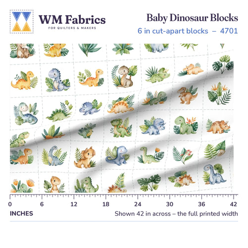 Baby Dinosaur Blocks fabric shown 42 inches across with a ruler for true print scale
