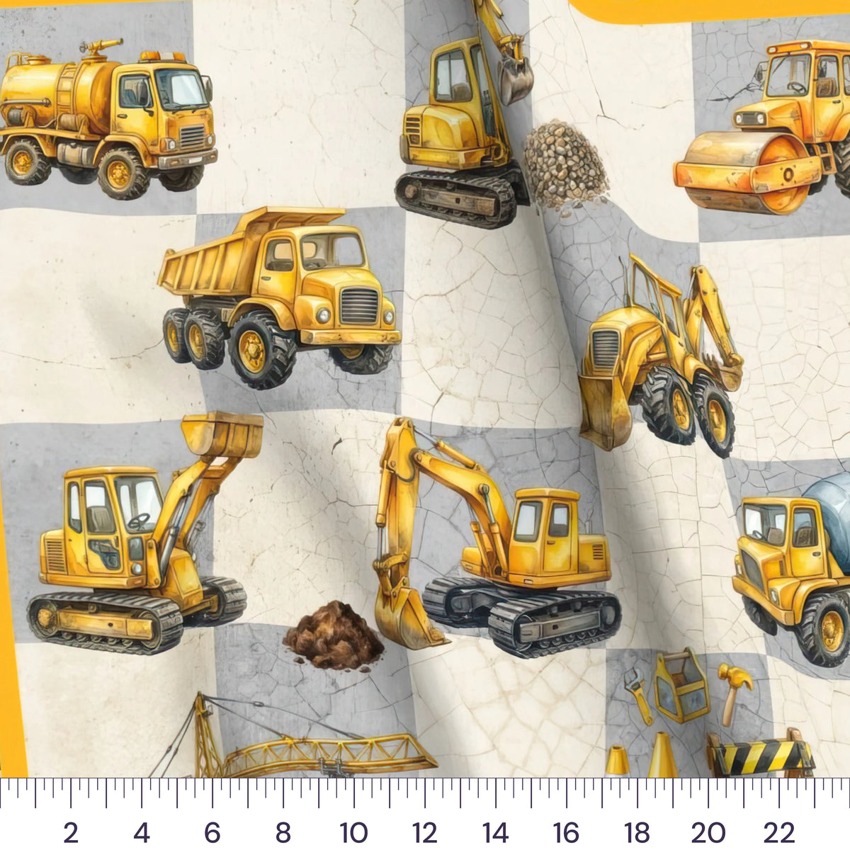 Close-up of the Little Diggers baby quilt panel with a ruler showing true scale