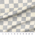 Concrete Checker 3 inch distressed checkerboard quilting cotton close-up with a ruler showing true scale