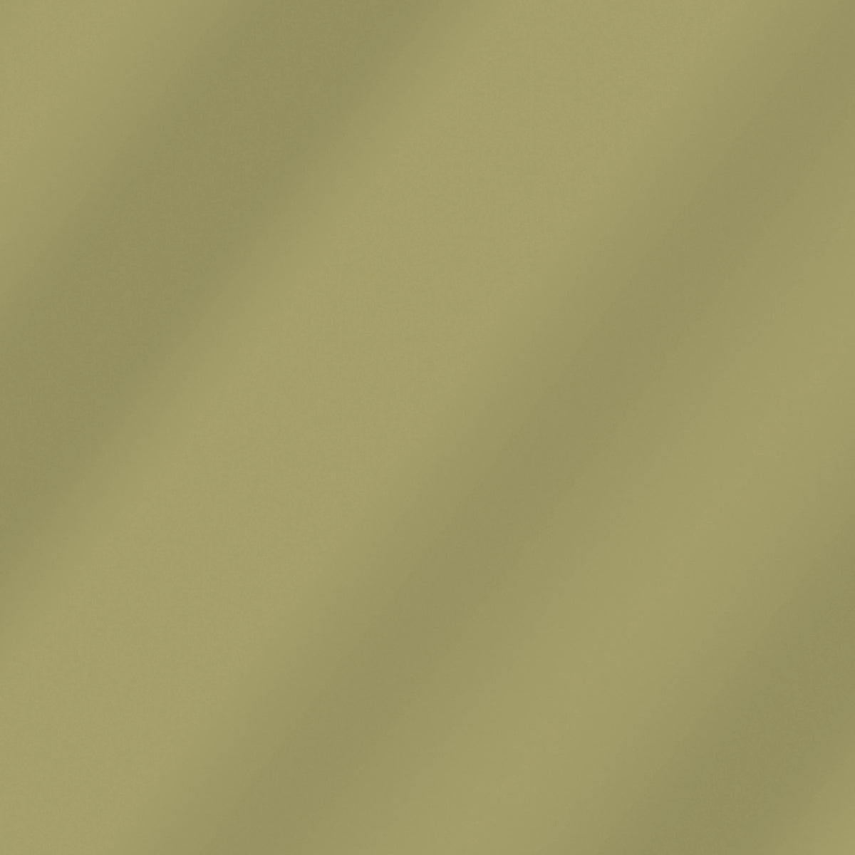 Sunlit Moss solid quilting cotton – soft draped fabric showing the true color