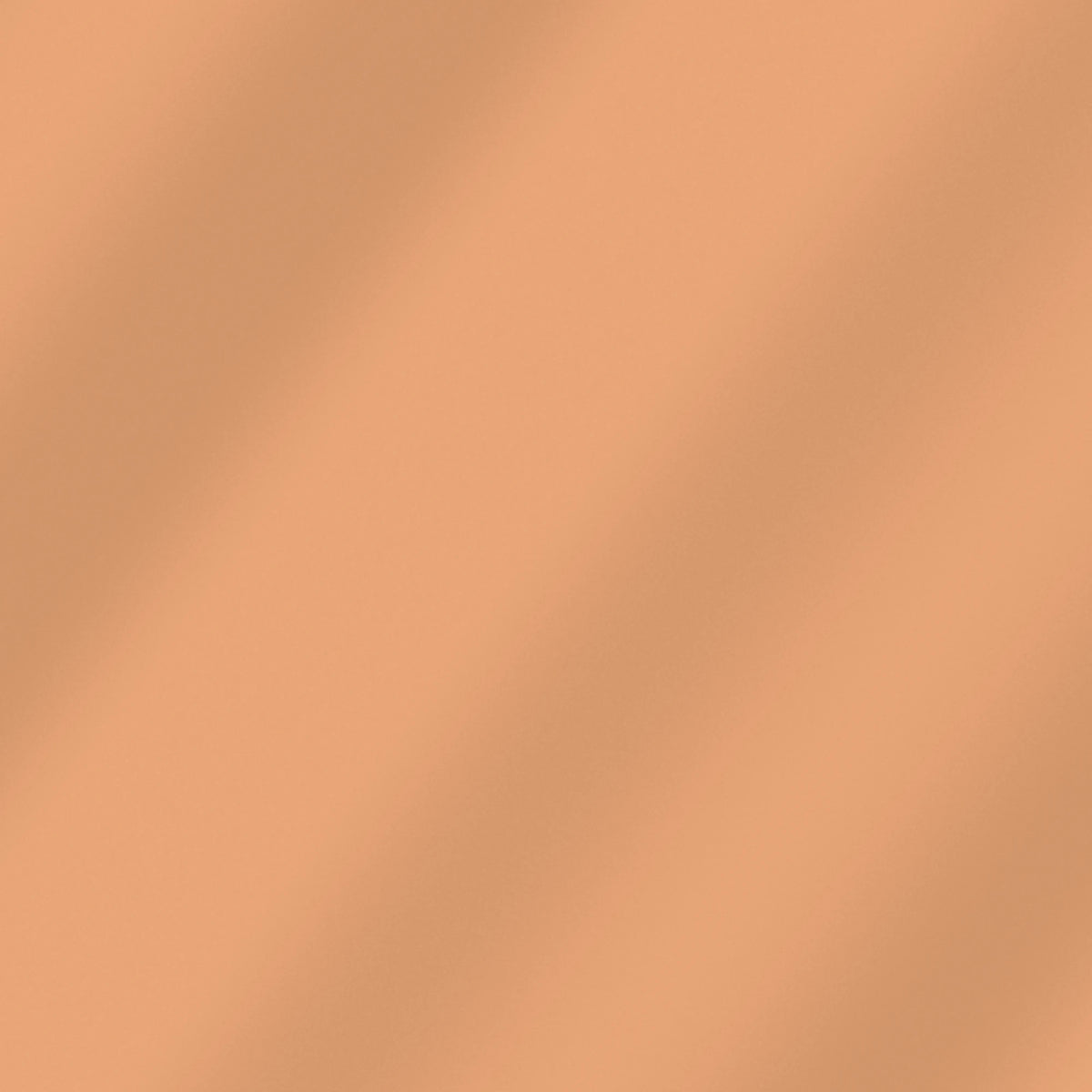 Chanterelle solid quilting cotton – soft draped fabric showing the true color