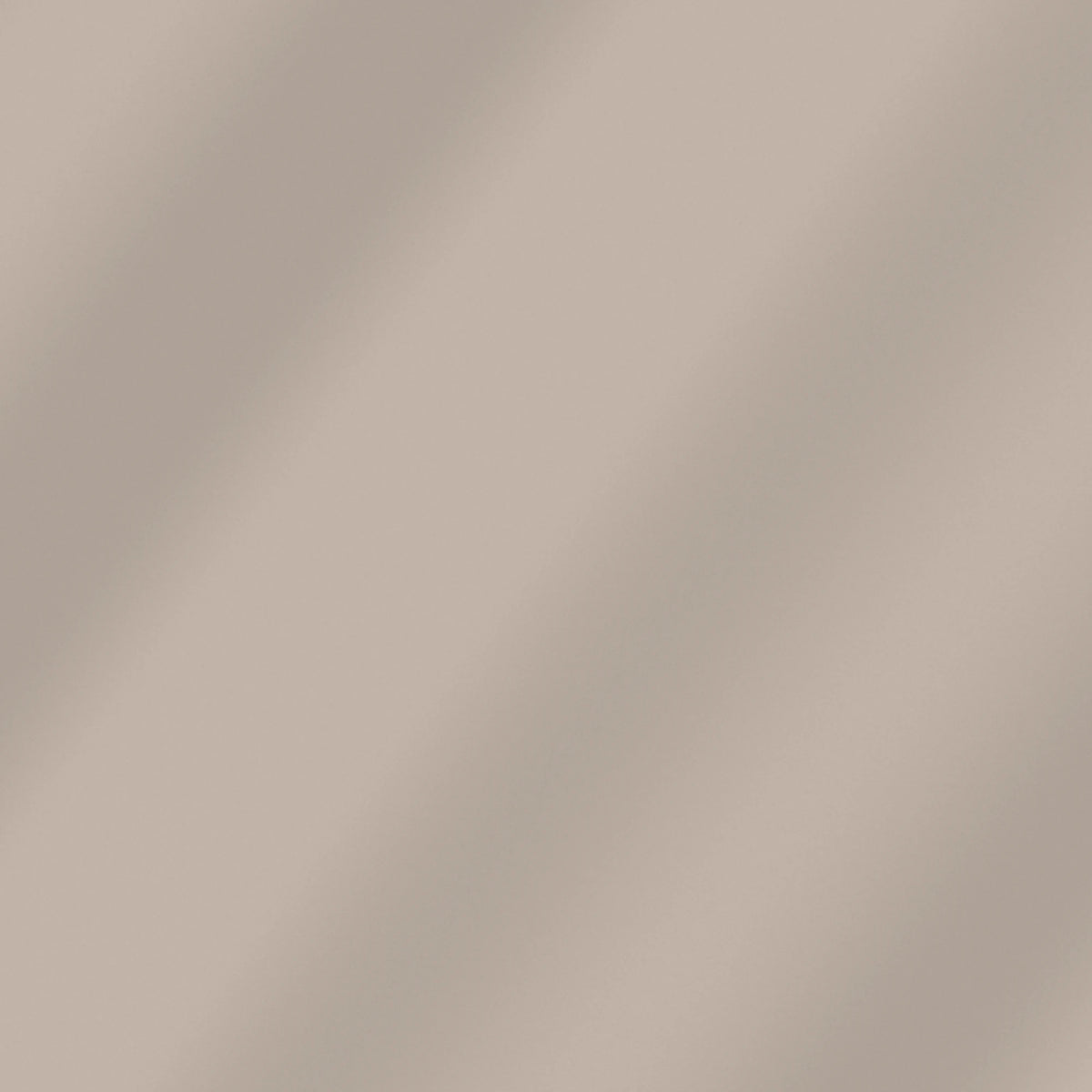 Owl Feather greige solid quilting cotton – soft draped fabric showing the true color