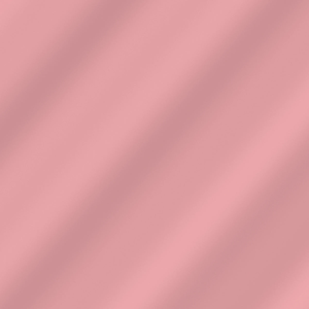Solid Rose Blossom quilting cotton – soft draped fabric showing the true color
