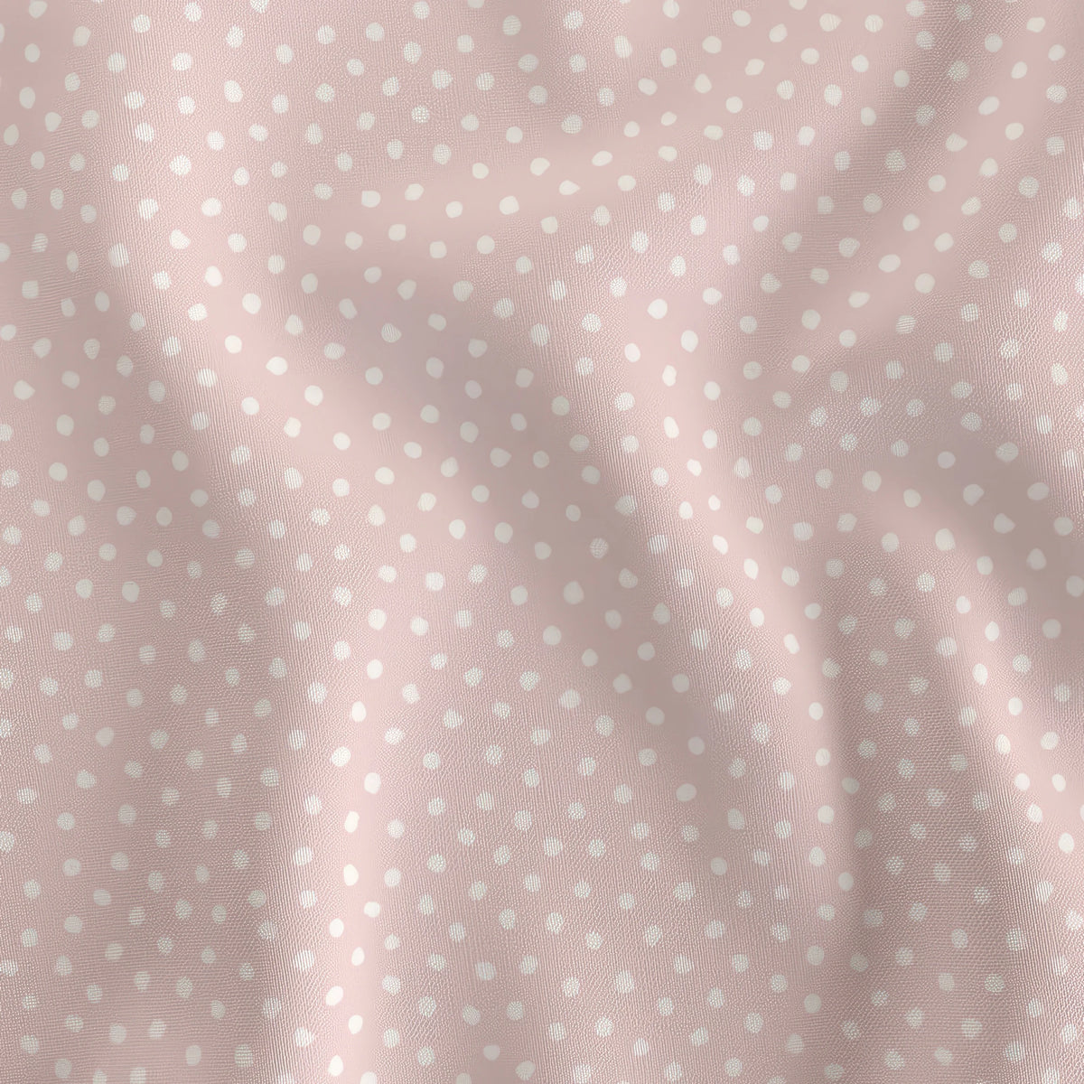 Petal Doodle Dots pink dot quilting cotton draped to show the soft hand