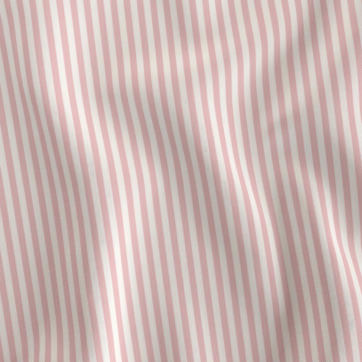 Rose Petal pink and cream stripe quilting cotton draped to show the soft hand