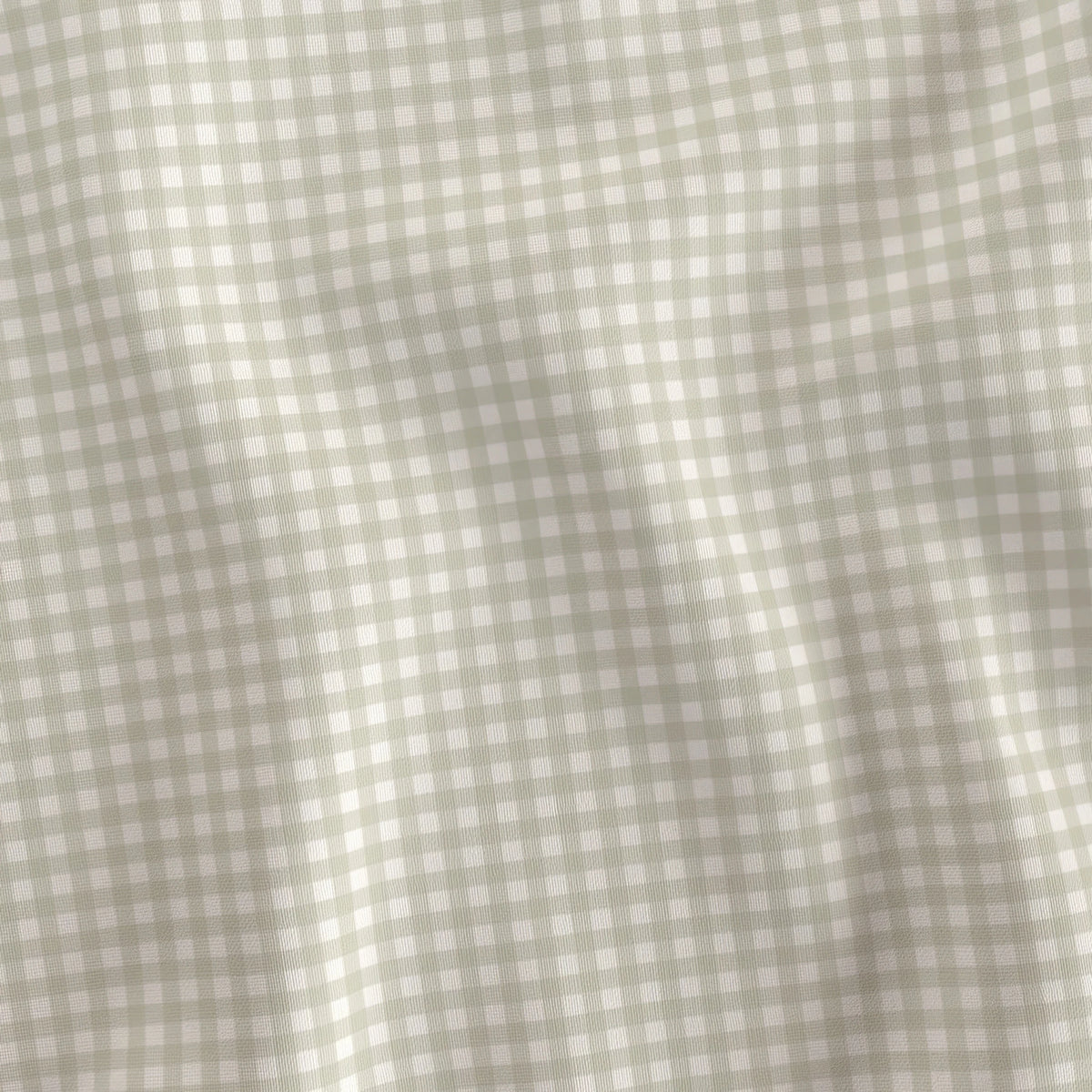 Sage green and cream mini gingham quilting cotton draped to show the soft hand