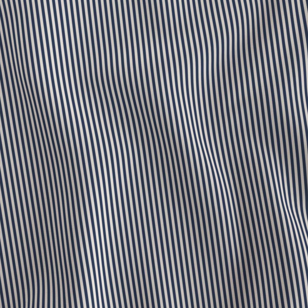 Navy & Cream 1/8 inch candy stripe fabric draped to show the soft hand and fine deep navy and creamy off-white stripe