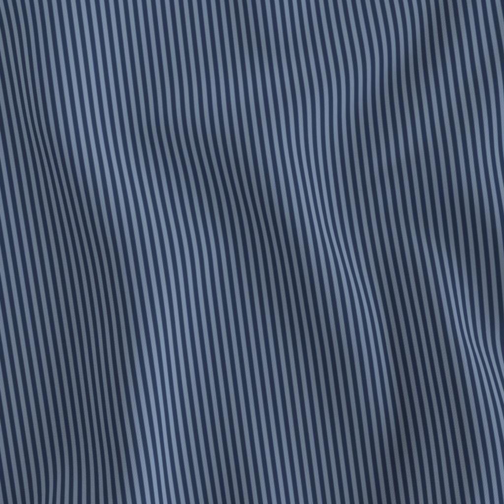 Navy & Dusty Blue 1/8 inch candy stripe fabric draped to show the soft hand and fine deep navy and dusty blue stripe