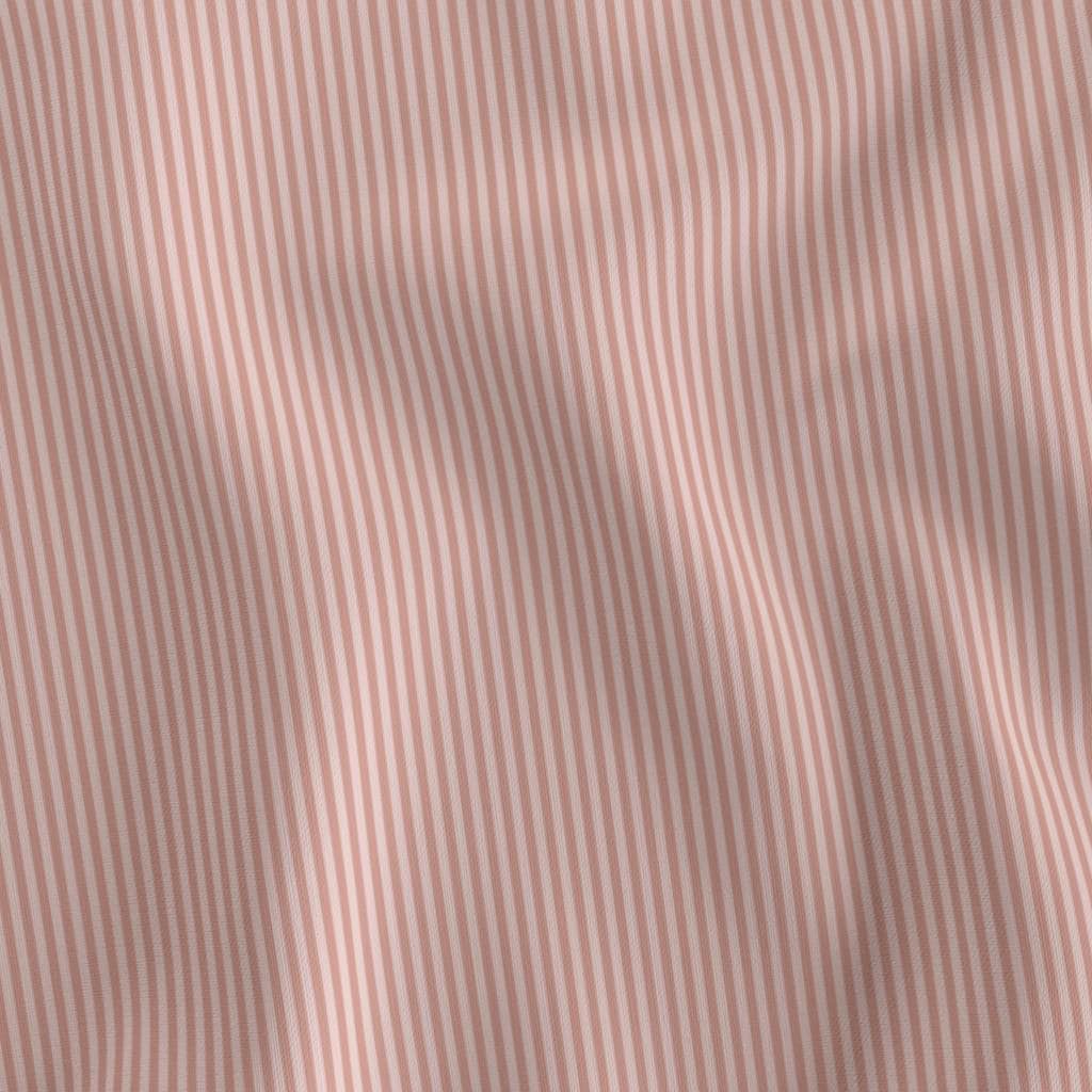 Blush Pink 1/8 inch candy stripe fabric draped to show the soft hand and fine blush pink and cream stripe