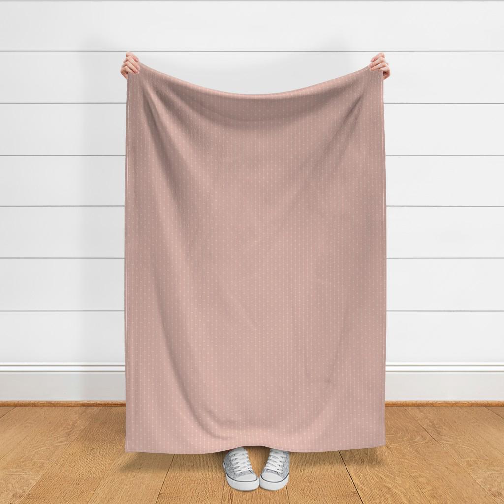 Quilting cotton in blush pink blender fabric with blush pink geometric dot design