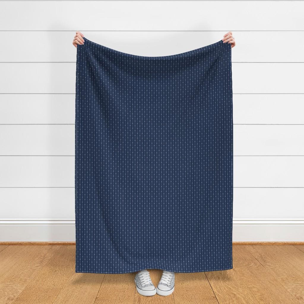 Quilting cotton in navy blender fabric with navy geometric dot design