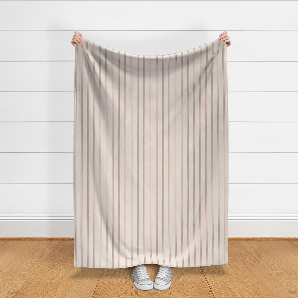 Full yard of Blush & Cream heritage stripe fabric held up to show the size of one yard