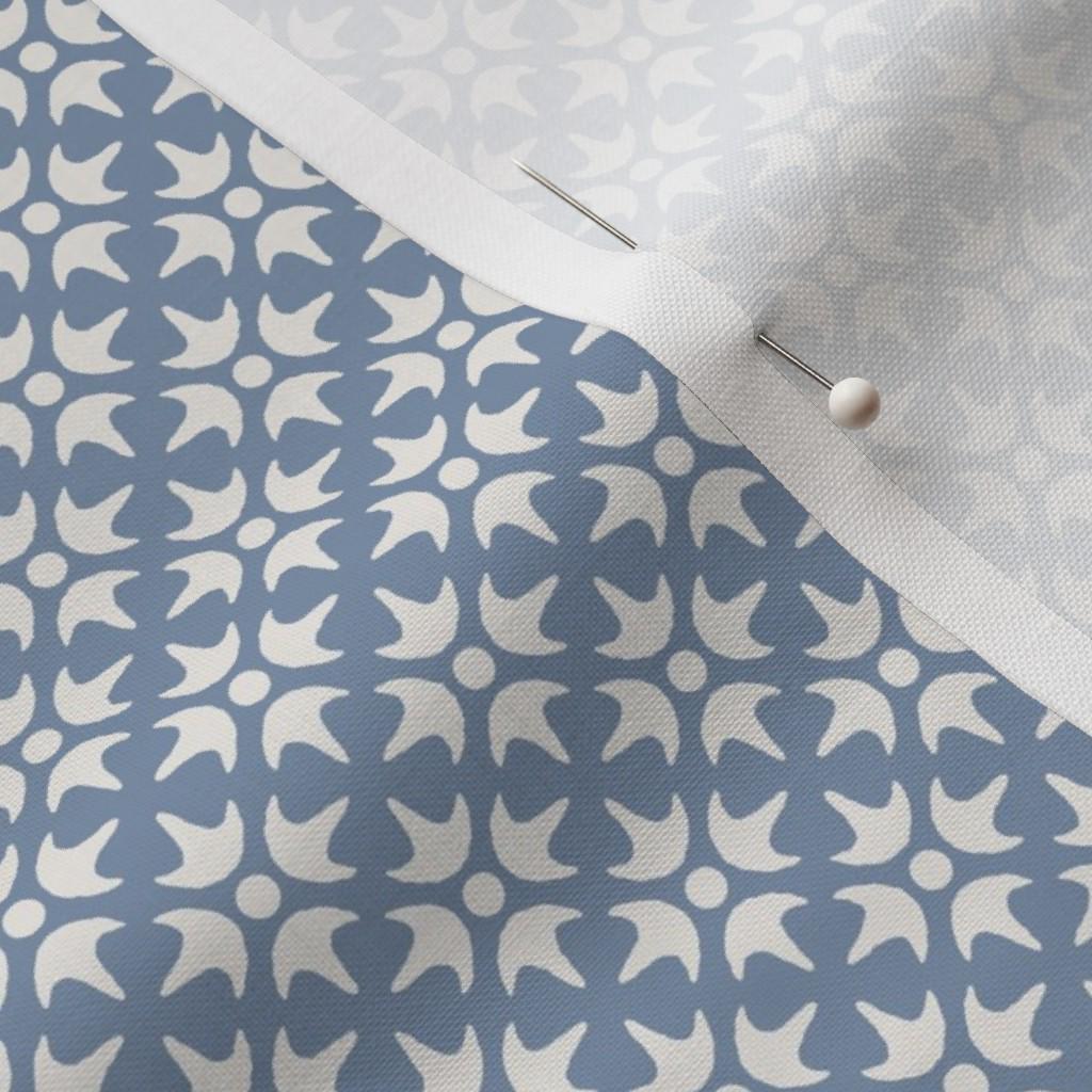 Soft Blue & Cream Thistle Star fabric showing the soft blue geometric lattice print on cotton quilting fabric