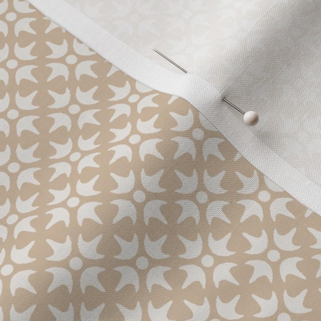 Beige & Cream Thistle Star fabric showing the beige geometric lattice print on cotton quilting fabric