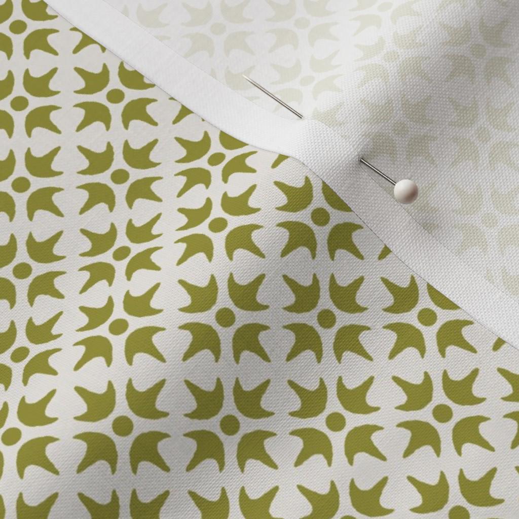 Chartreuse & Cream Thistle Star fabric showing the chartreuse green geometric lattice print on cotton quilting fabric