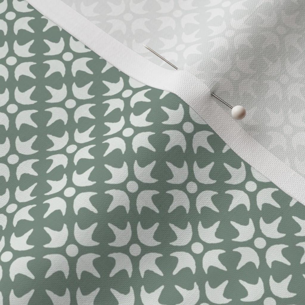 Sage Green Thistle Star fabric showing the sage green geometric lattice print on cotton quilting fabric