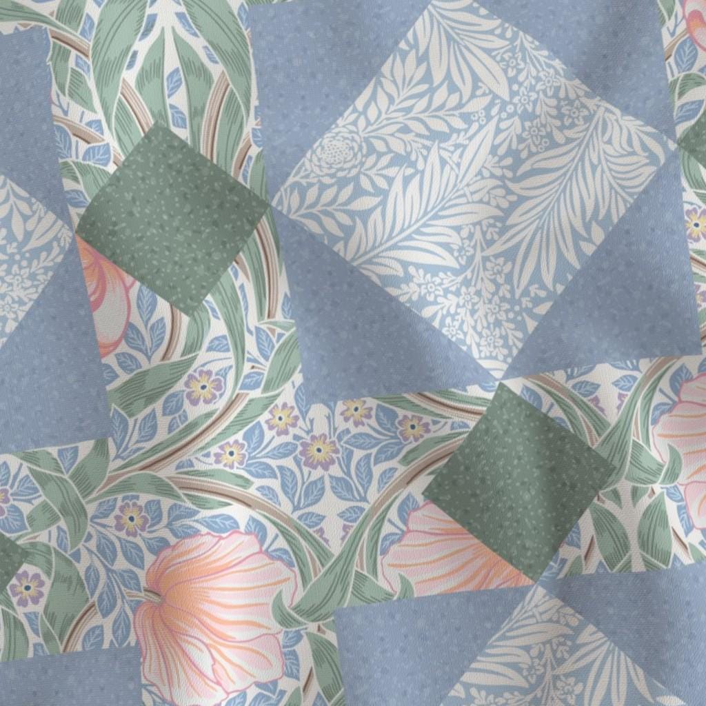 Close-up of lone star patchwork with blue blenders, sage and peach Pimpernel tulips