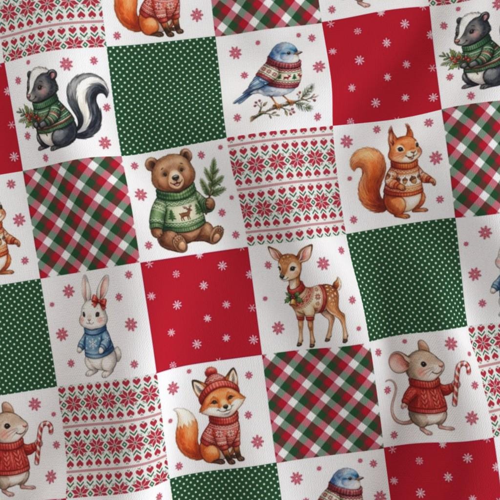 Christmas fabric detail with foxes, squirrels, birds and plaid patchwork blocks