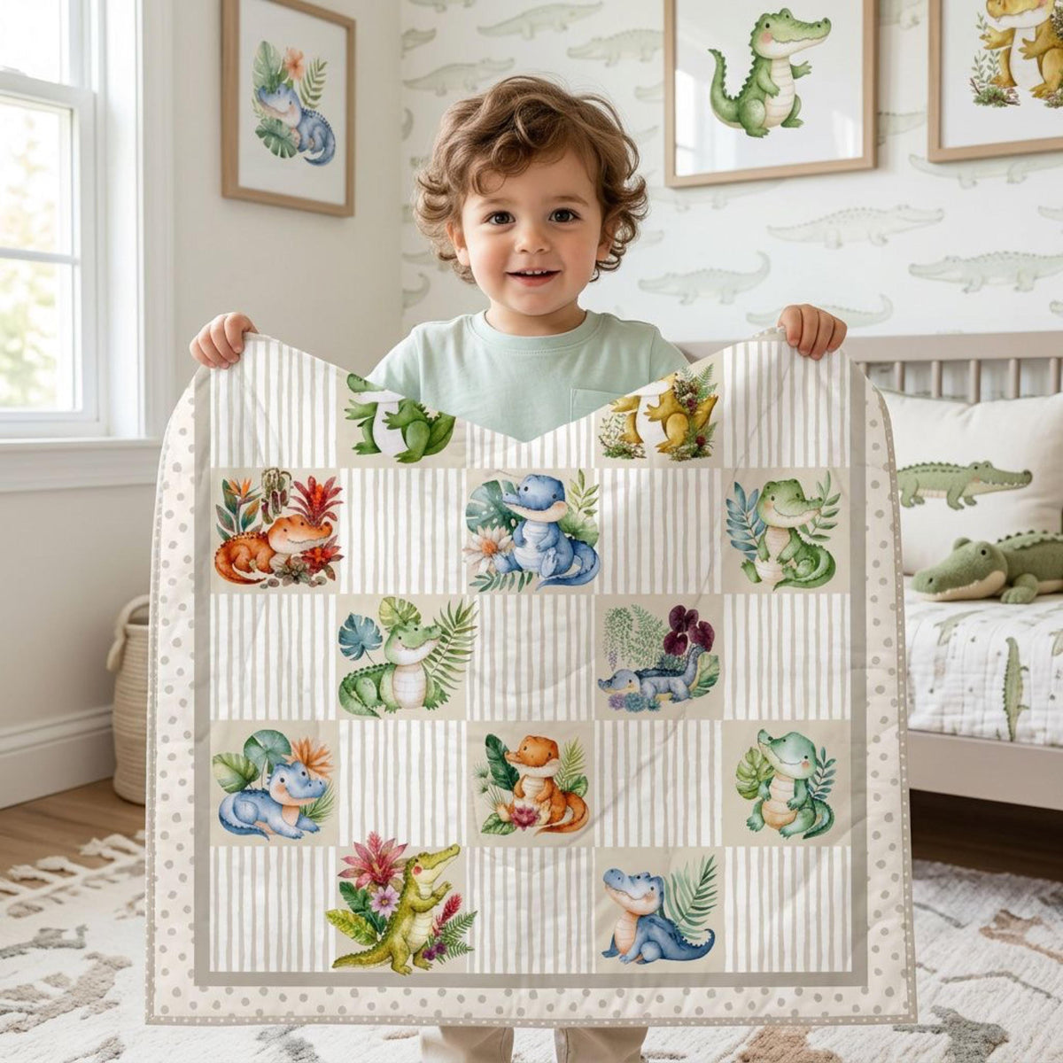 Young child holding a finished alligator nursery quilt