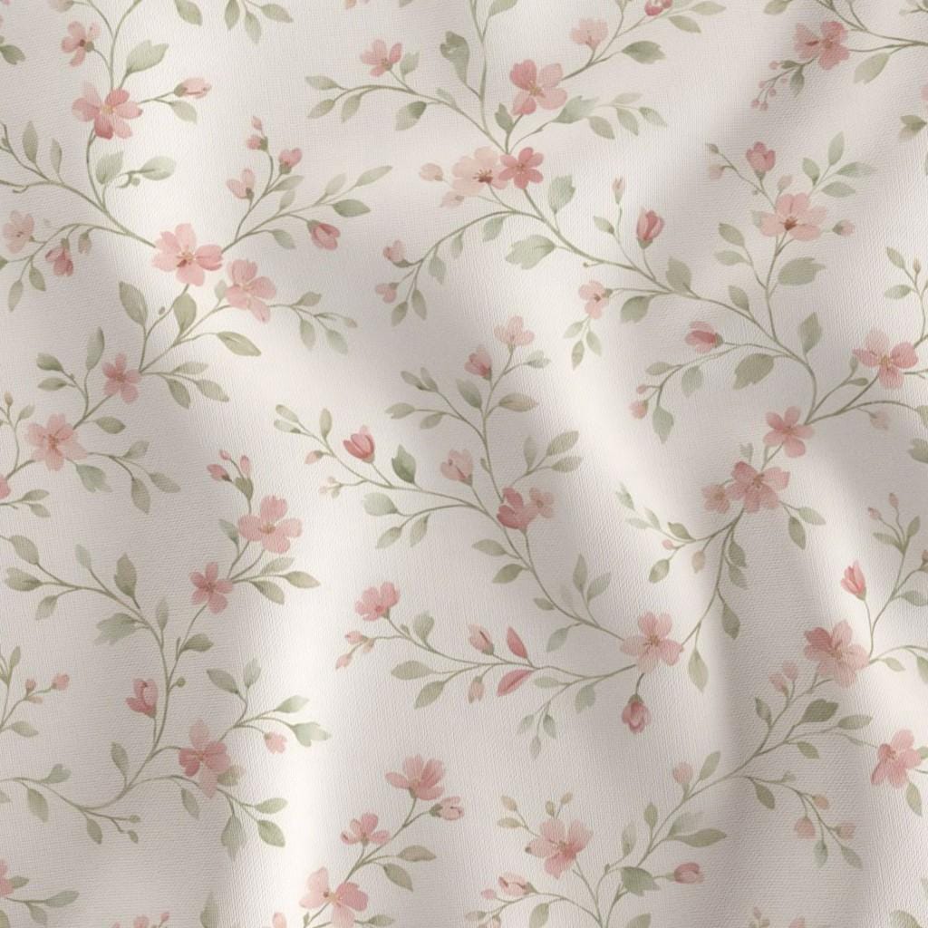 Close-up of Elodie Floral watercolor print in dusty blush and sage on ivory quilting cotton